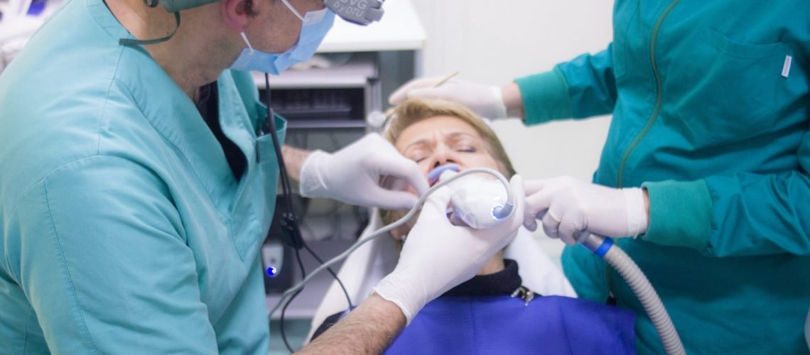 Dentists Giving Nitrous Oxide To Child Patient